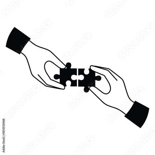 Two hands connecting puzzle pieces symbolizing teamwork and collaboration
