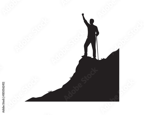 Silhouette of Hiker on Mountain Peak Raising Arm in Victory