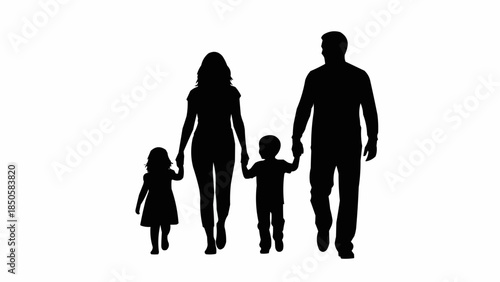 Silhouette of a happy family walking together holding hands.