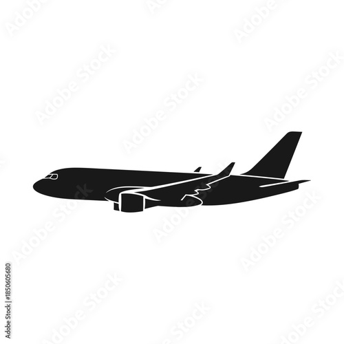 Abstract dark silhouette of a person working on a computer in an office setting