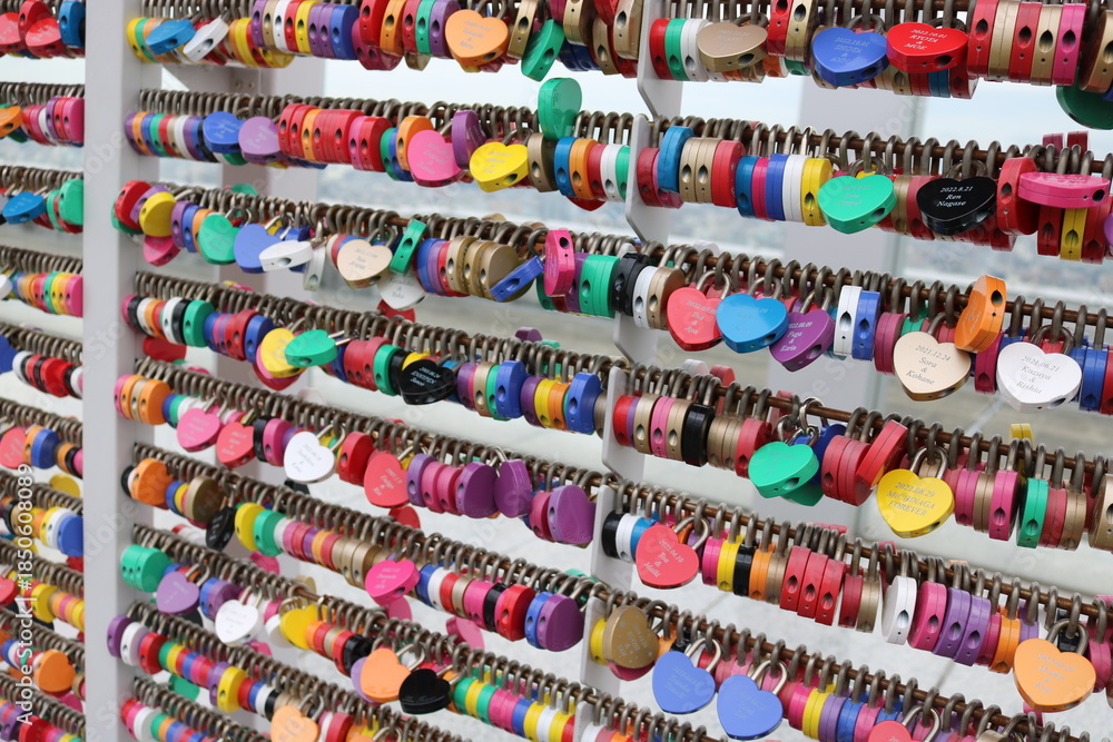 Obraz premium Colorful Love Locks Background at Romantic Travel Destination for Couples