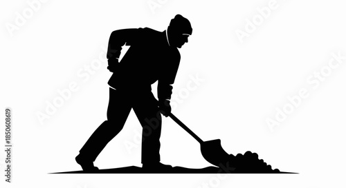 Silhouette of a man shoveling dirt, working hard, construction worker.