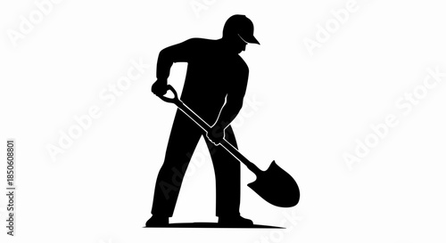 Silhouette of a man digging with a shovel, construction worker at work.