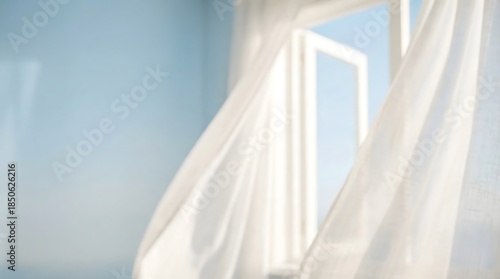 Foto White Curtains Blowing in Gentle Breeze from Open Window