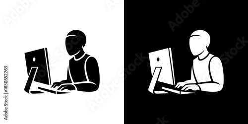 A person working on a computer shown in positive and negative contrast