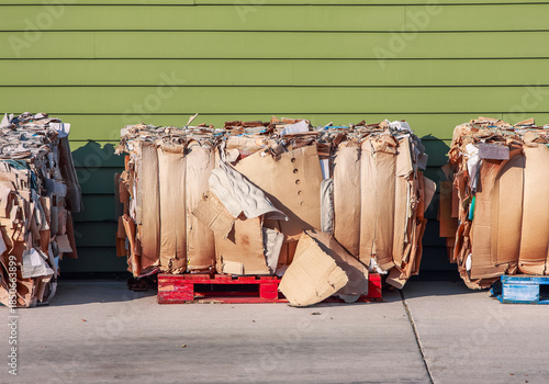 Cardboard boxes sitting on pallets ready for recycling