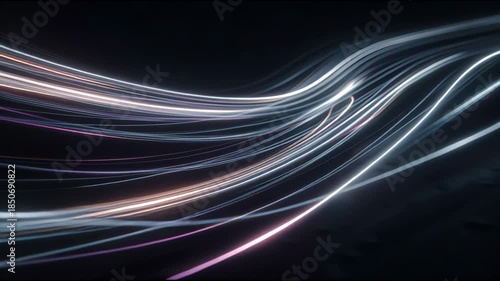 Light trails move gracefully through darkness creating abstract spell-like effects