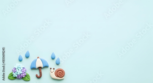 梅雨の紫陽花とカタツムリと傘のかわいいクレイアートフレーム背景