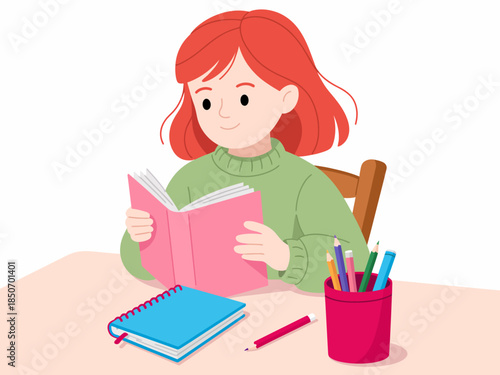 A cheerful young girl with red hair is happily reading a pink book at a table filled with colorful stationery supplies like pens and notebooks, embodying a love for learning.