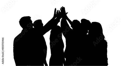 Group of diverse professionals celebrating success with a high five indoors.