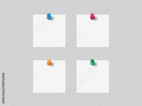 Four blank white square notes pinned with colorful pushpins