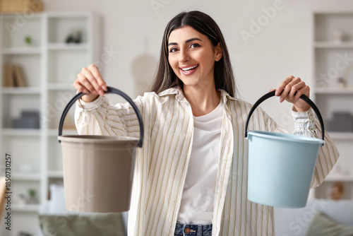 Young woman with plastic bu...