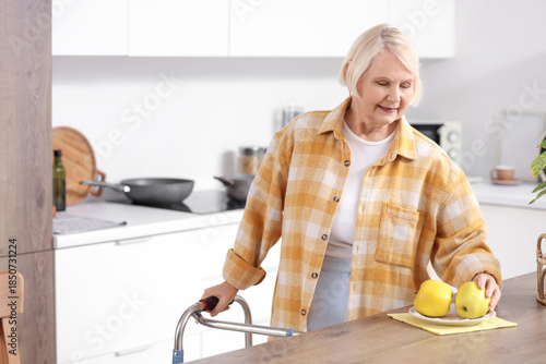 Senior woman with walker an...