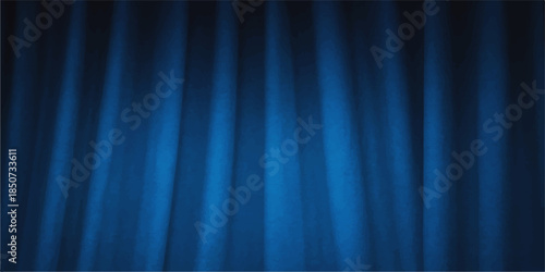 Velvet blue stage curtain backdrop with theater light and wave texture