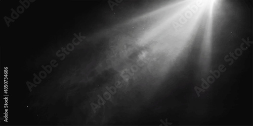 Spotlight texture with light rays in dark mist and cloud backdrop