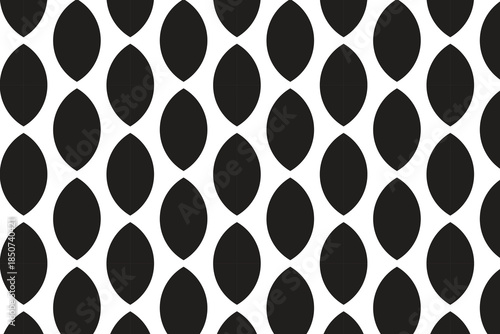 This black and white geometric pattern features repeating vertical oval shapes. The ovals are solid black and arranged in staggered columns, creating an interlocking effect against the white backgroun