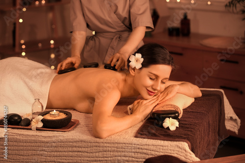 Young woman getting massage...