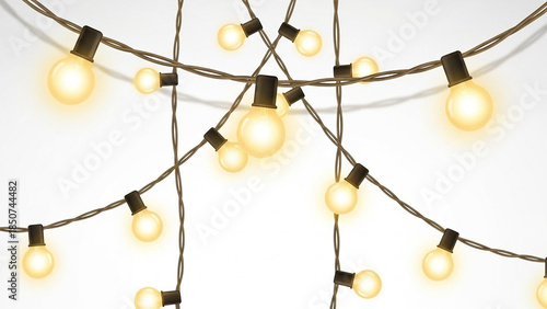 Multiple strands of warm glowing yellow light bulbs creating a festive and decorative illumination against a light background.