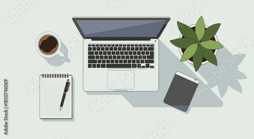 Overhead View of a Modern Workspace with Laptop, Coffee, Notepad, and Plant