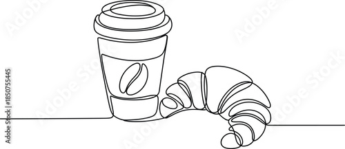 Coffee cup and croissant on a table breakfast food