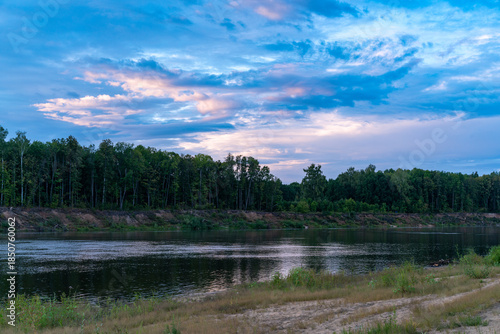 Sunset on the cloudy river.