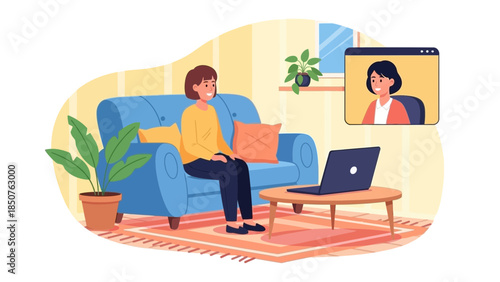 A woman sits on a blue couch in a cozy living room with a laptop and participates in a video call with another woman displayed on the screen