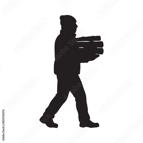 Silhouette of Man Carrying Firewood Logs Walking