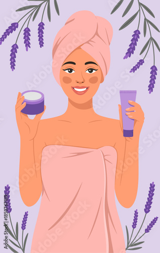 A happy woman in a towel holding skincare products surrounded by lavender flowers, embodying self-care, relaxation, and beauty in a soothing and elegant environment.