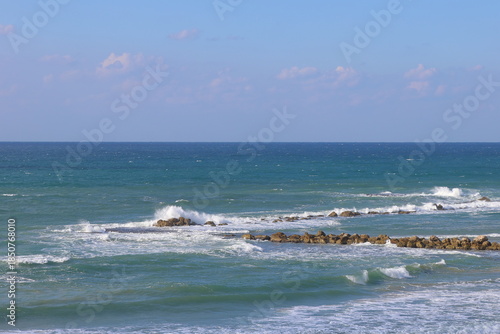 Waves breaking on the rocks in the Mediterranean Sea, Israel.