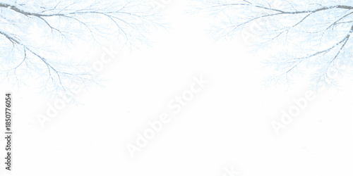 Winter holiday background with snow-covered branches, blue frozen pattern, and snowflake frame design