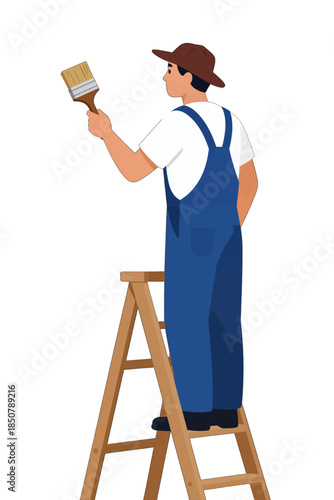 Man in overalls holding paintbrush while standing on ladder.