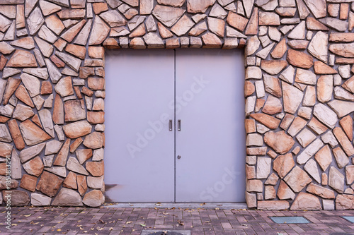 sidewalk by street wall  and  door