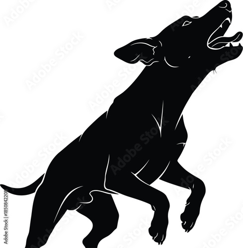 Silhouette of a dog howling with head raised