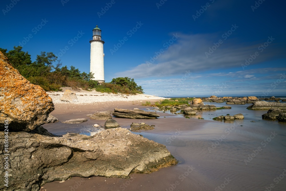 Fototapeta premium view of the historic Faro Lighthouse on the Swedish island of Faro in the Baltic Sea