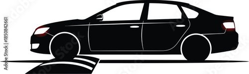 Silhouette of a car driving over a speed bump