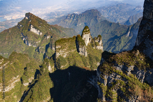 Tianmen Mountain with its pierced rock above the city of Zhangjiajie in Hunan, China.