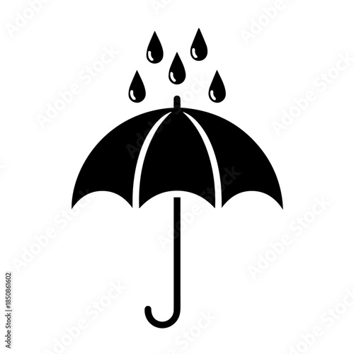 Open umbrella in rain