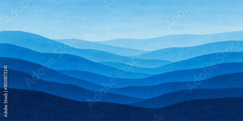 Abstract blue wave background featuring a misty mountain landscape with snow peaks under a cloudy sunset sky and a dense forest valley