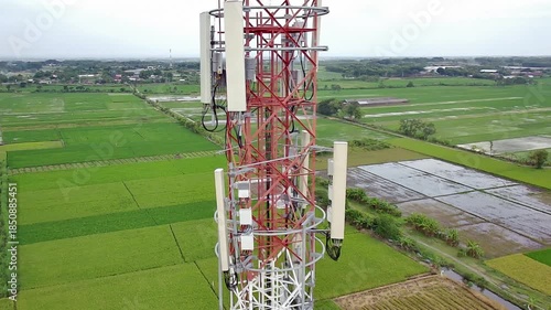 Drone pulling back away from cellular communication tower