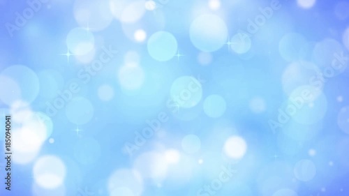 青　玉ボケ　キラキラ　ループ動画　抽象的　ふわふわ　パーティクル　爽やか　光る　おしゃれ　Sparkling abstract background.Blue glitter bokeh lights.Loop video.