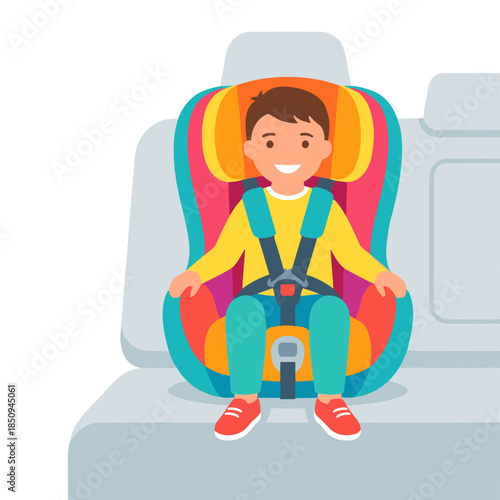Happy boy riding safely in car seat