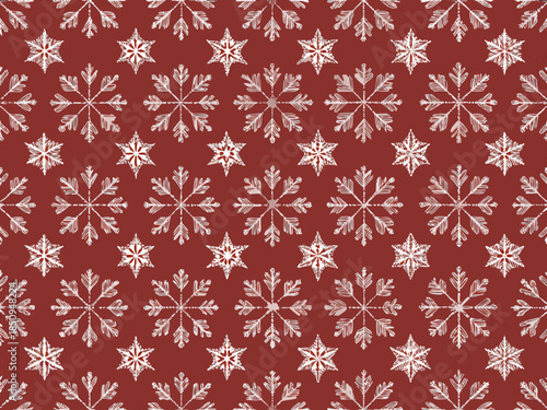 Seamless pattern of delicate white snowflakes on a rich maroon background
