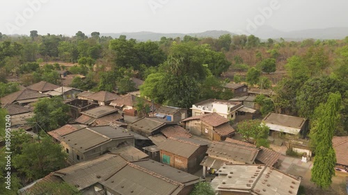 Aerial view of a Indian village surrounded forest 