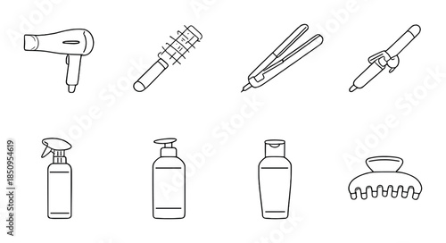 Black and white hair styling tools on dark background