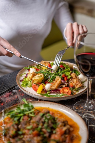 Wallpaper Mural Woman eating gourmet salad with mozzarella Torontodigital.ca