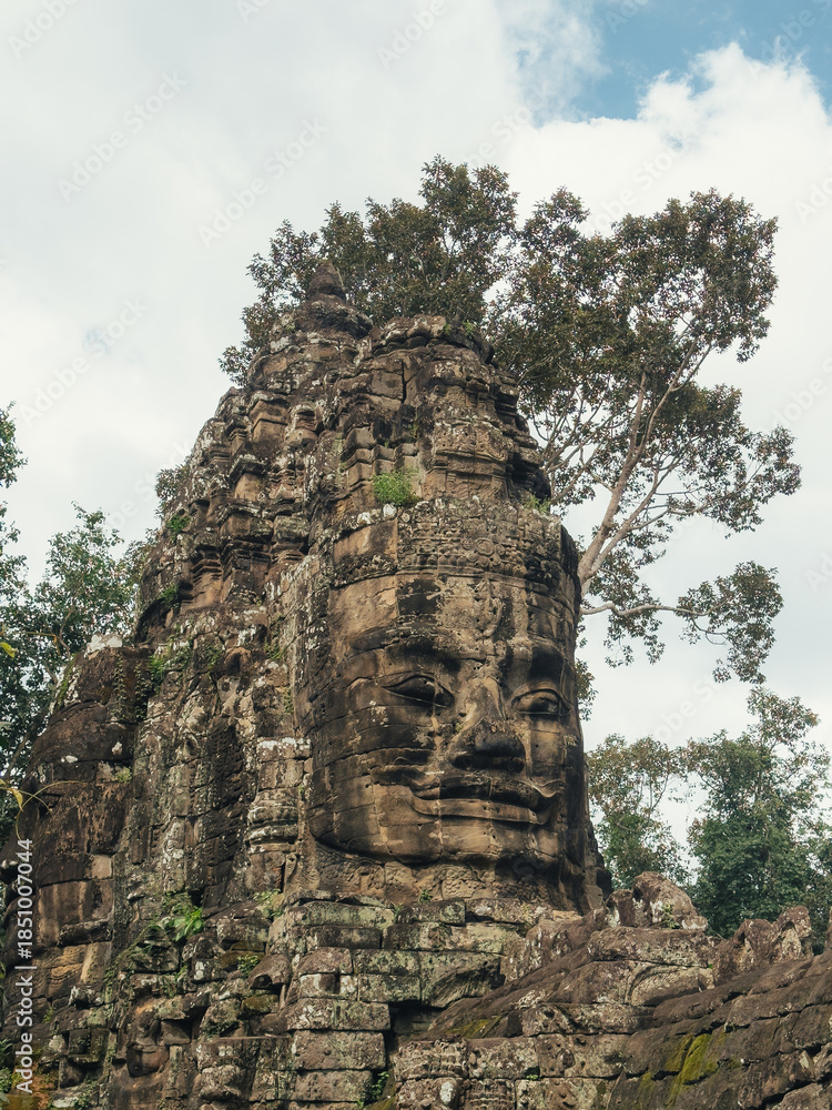 Fototapeta premium Serene Bayon Stone Face At Angkor Thom, Cambodia Heritage Temple Landmark