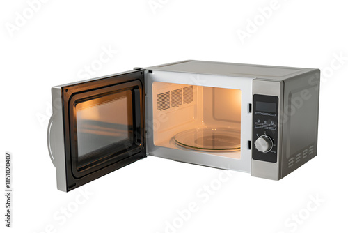 Open microwave oven with interior light on isolated on transparent background