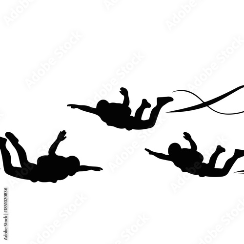 Three Skydivers In Freefall Silhouette Formation.