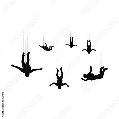 Silhouettes of five acrobats suspended by ropes.