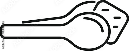 Sugar tongs holding a white sugar cube for coffee or tea